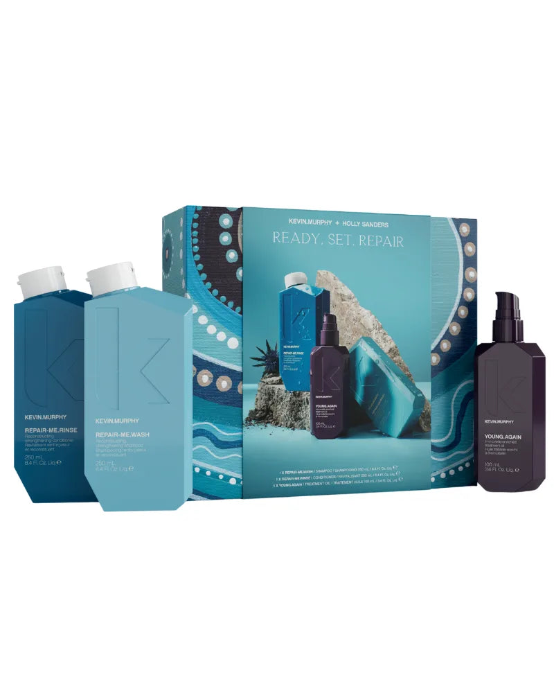 Kiehl's 'Ready, Set, Repair' skincare product set with packaging on a white background